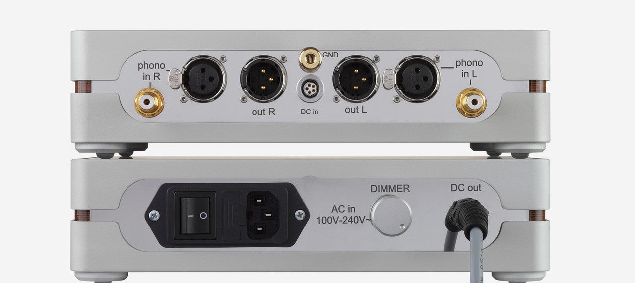 The absolute phono inside is built without compromise, incorporating an anti-resonance sandwich construction machined from solid blocks of aluminum and panzerholz wood. The sophisticated power supply, located in a second, similar, matching, chassis, keeps mains interference to a minimum. Hand-selected state-of-the-art non-magnetic silver Clearaudio Glimmer capacitors positioned at key areas of the circuit further ensure excellent clarity and purity of sound. Like the absolute phono, a single multi-function