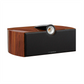 Triadence speaker with wooden and black design on a white background