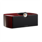 Triange speaker with red and black design on a white background